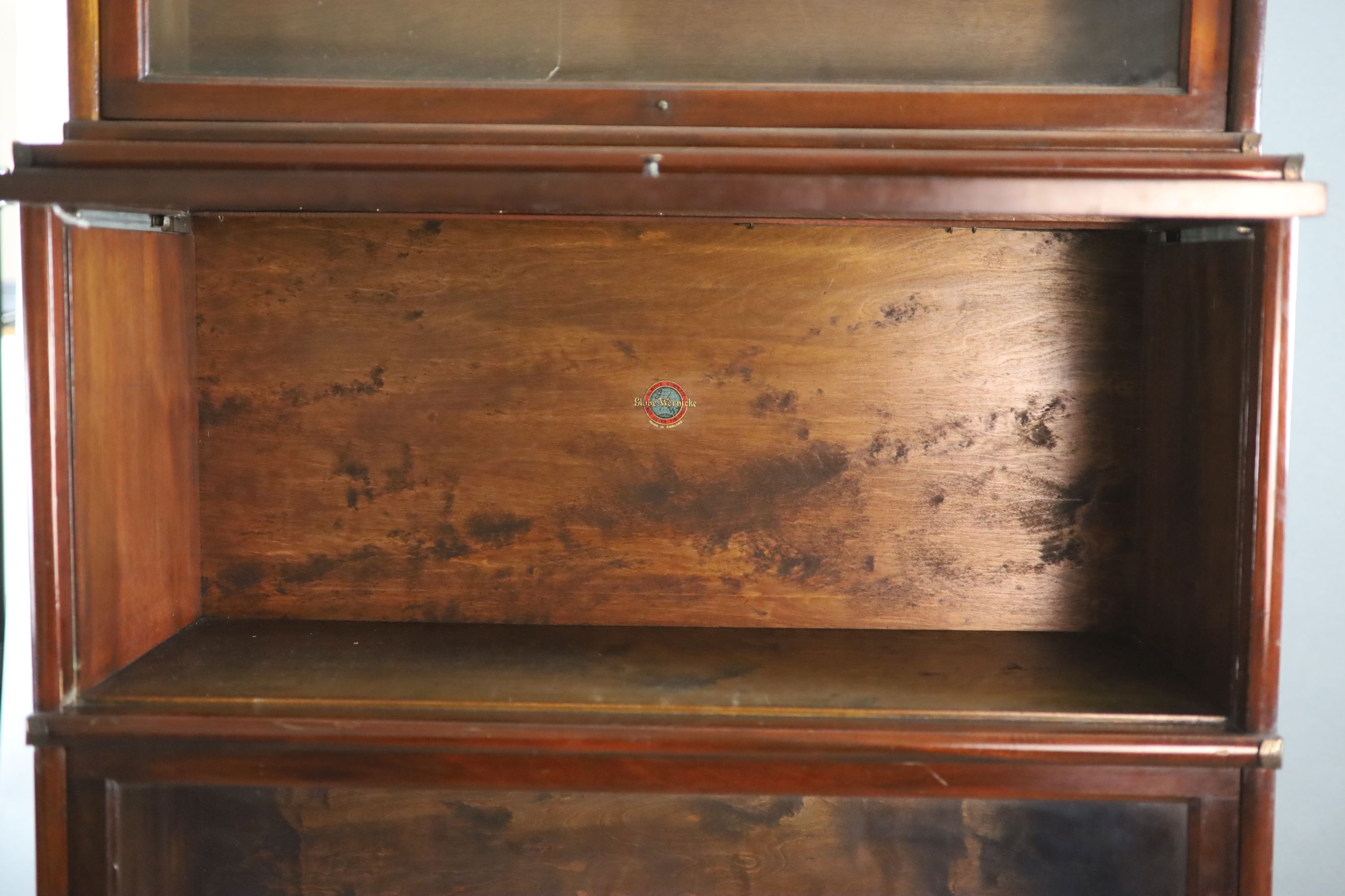 A Globe Wernicke mahogany sectional bookcase, W.86.5cm D.36cm H.216cm.